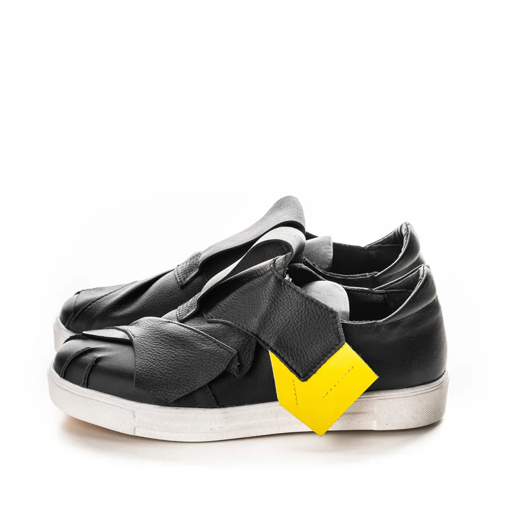 Bold black leather sneakers