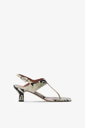 Sandals in natural python-print leather